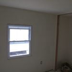 mobile home improvement interior room with window and closet